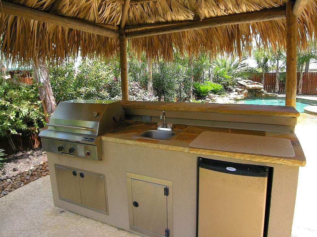 small outdoor kitchen with sink